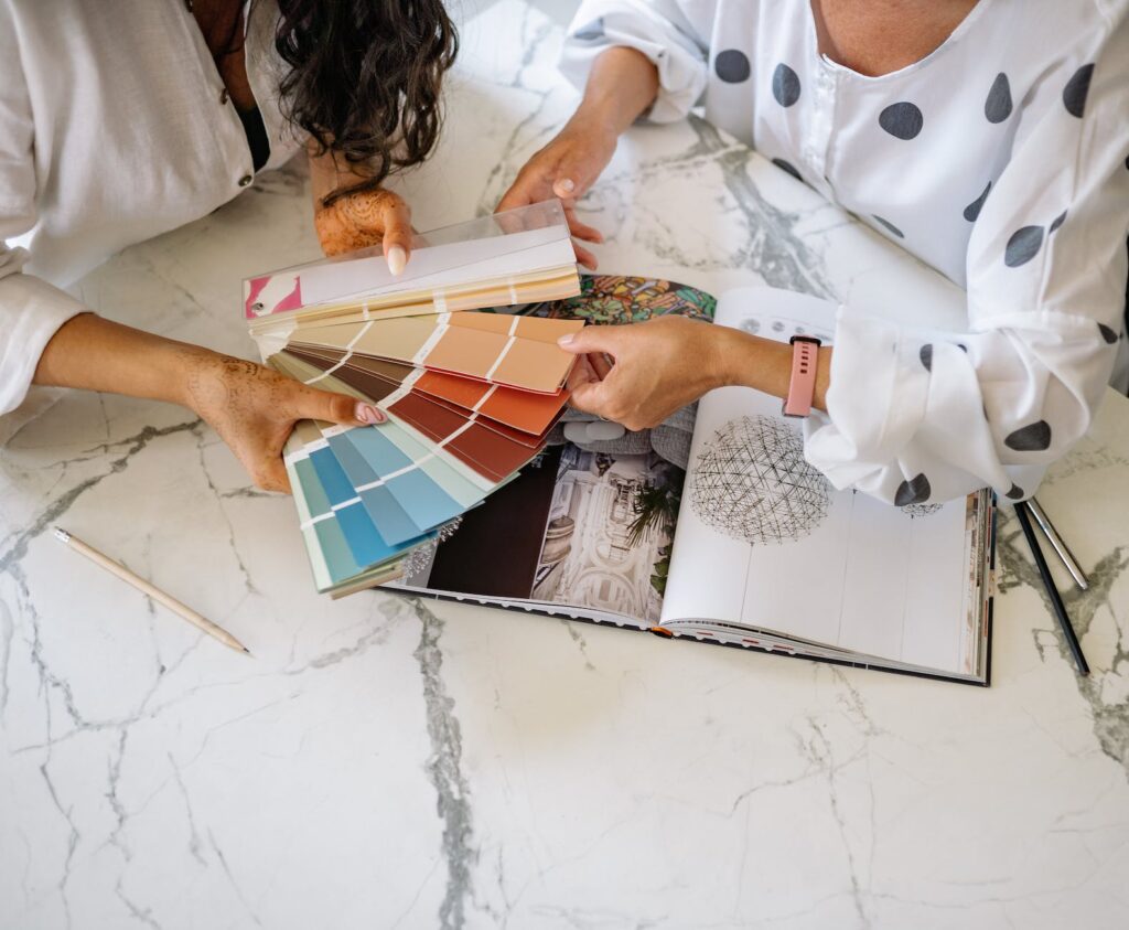 women holding a sample color chart