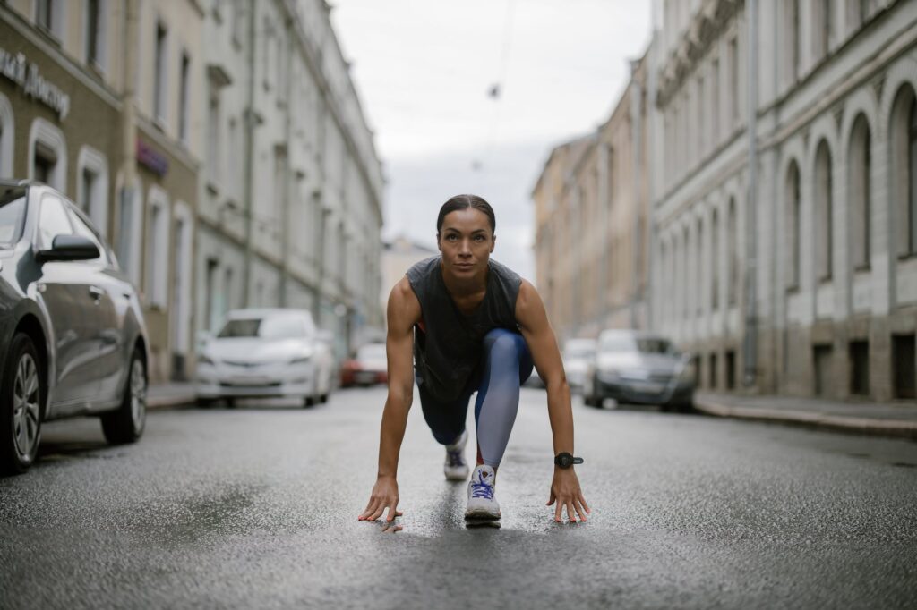 a woman getting ready to run