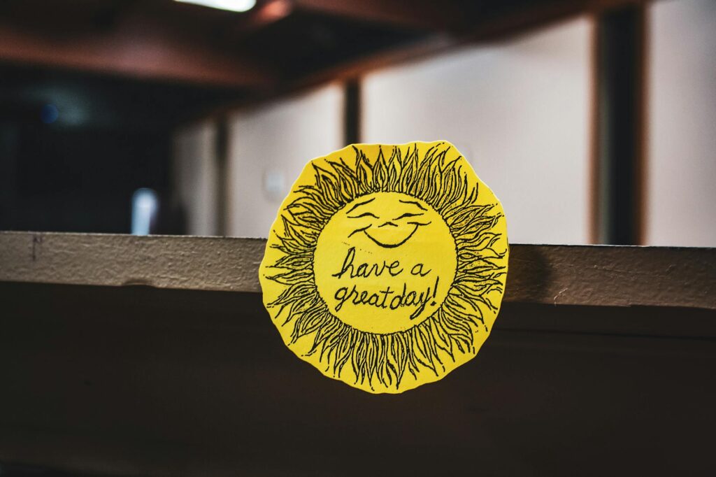 have a great day sticker on brown surface